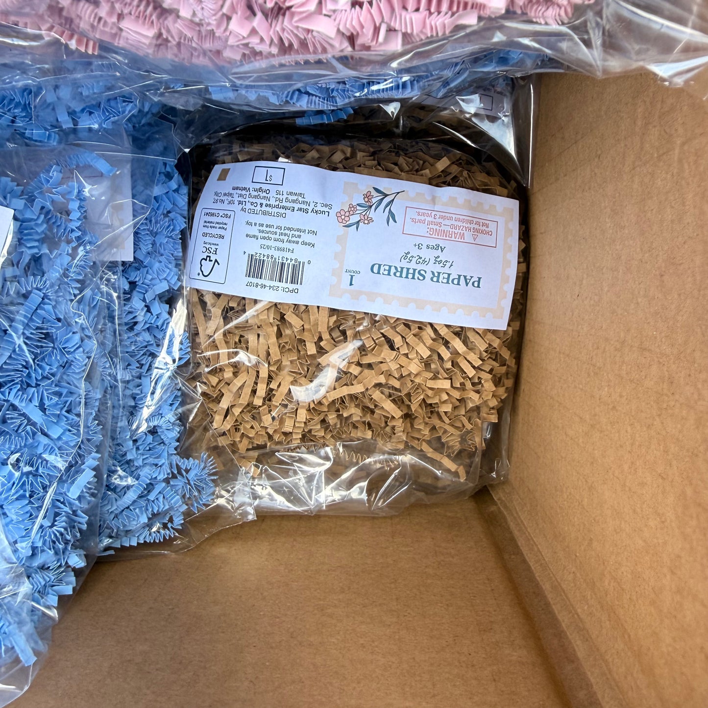 Box of 48+ 1.5oz Paper Shred Filler Light Pink, Blue, Brown - Spritz™
